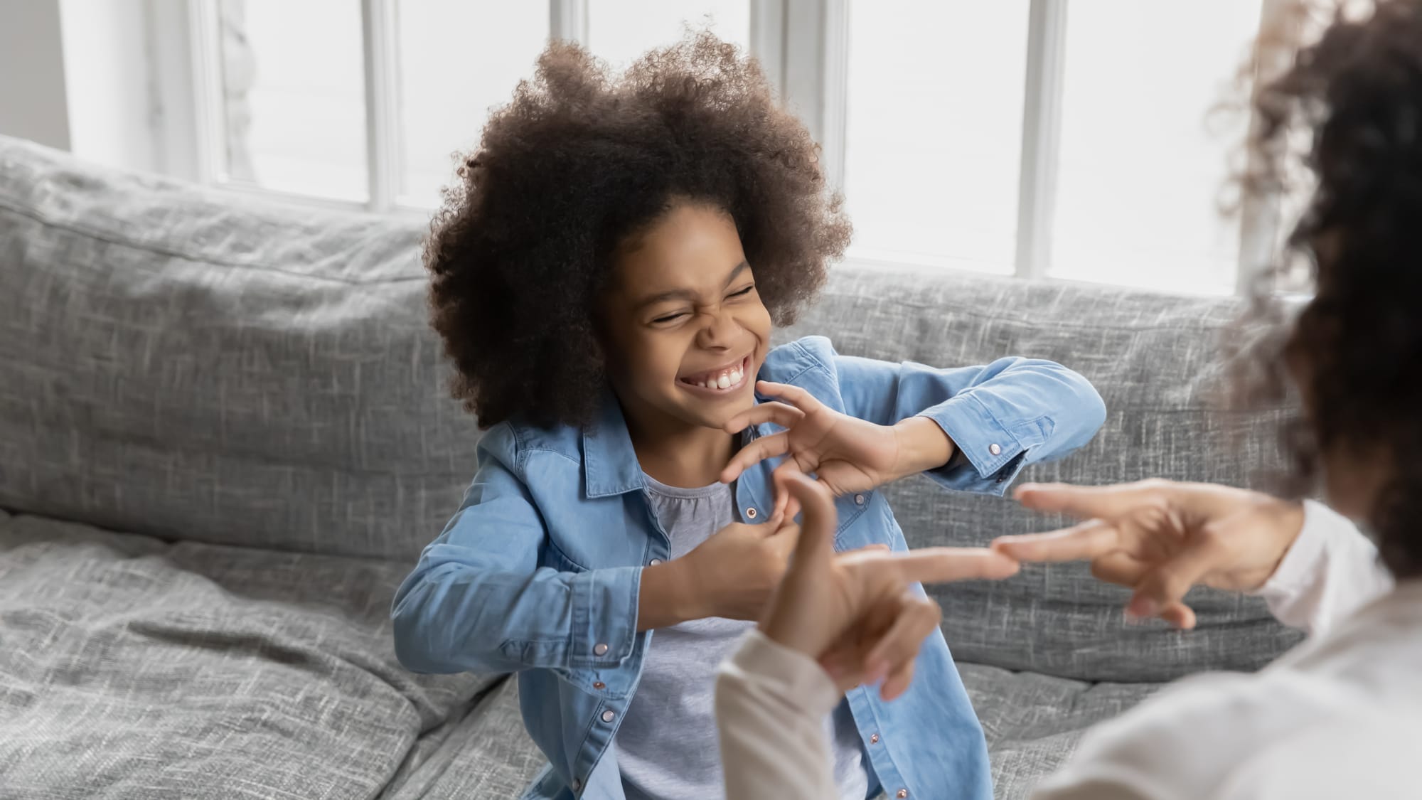 Attitudes Towards Deafness: American Sign Language v. Oral School