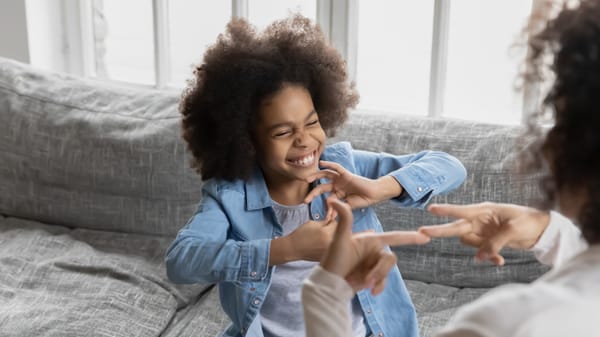 Attitudes Towards Deafness: American Sign Language v. Oral School